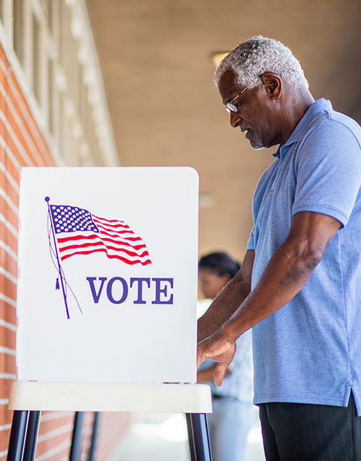 Someone holding a vote button